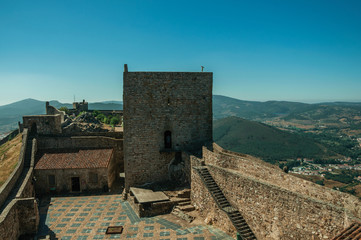 Large courtyard encircled by stone wall at the Marvao Castle