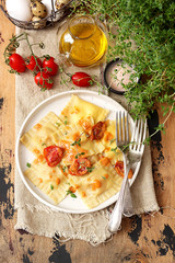 Ravioli  Italian pasta from dough with various fillings and cream sauce