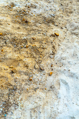 closeup of sea salt, colorful sand on the beach 