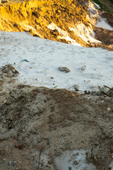 different colored sand on the sun