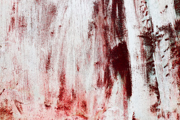 Background in horror style with texture of old rusty metal. A wall with imitation of smeared blood to Halloween