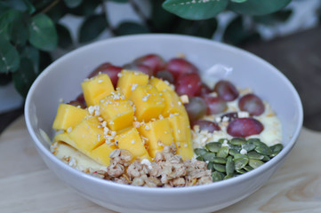 smoothie bowl, mango yogurt with fruit topping