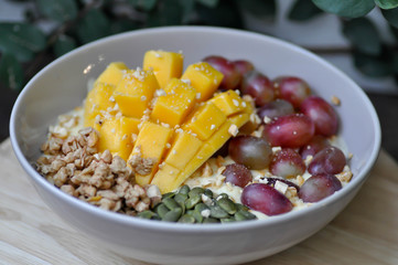 smoothie bowl, mango yogurt with fruit topping