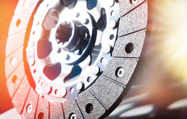 Close-up shot of clutch disk and basket on dark background