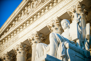 Equal Justice Under Law inscription in the neoclassical columned facade at the entrance to the US...