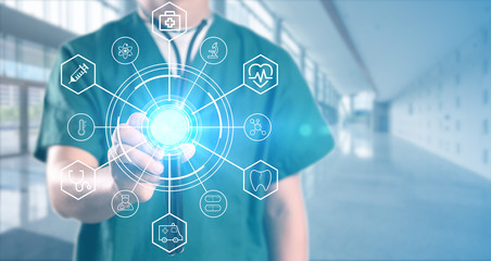 young doctor with hospital background