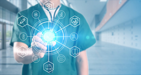 young doctor with hospital background