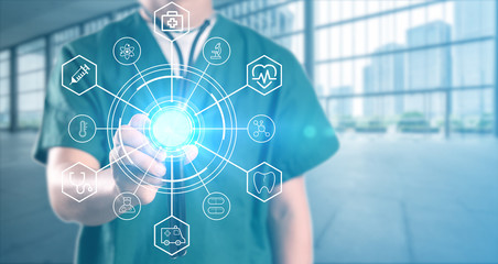 young doctor with hospital background