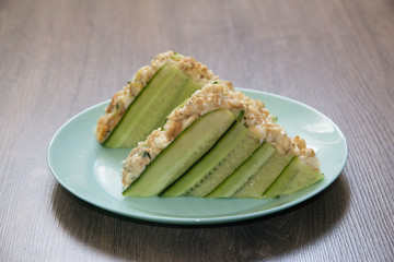Sandwich with tuna, cottage cheese, egg and cucumber