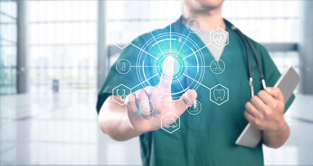 young doctor with hospital background