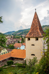 Fototapeta na wymiar Biertan fortified Lutheran Church gate tower in Sibiu County, Transylvania, Romania, high-angle view
