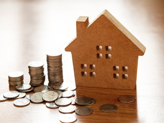 Home loan. Buy and sell houses and real estate. Business concept save money for home. Brown wooden...