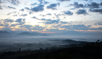 Mountains, trees, wind, sun, clouds