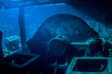 A natural light shot of the engine in the sunken shipwreck of the USS Kittiwake in Grand Cayman....