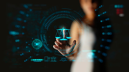 Legal advice technology service concept with businesswon hand working with modern Ui computer.