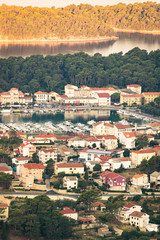 Obraz premium The town of Rab, Croatian tourist resort famous for its four bell towers.