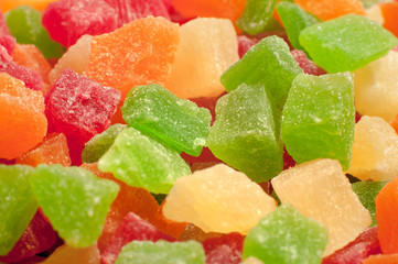 Heap of sweet colorful delicious candied fruits. Macro shot