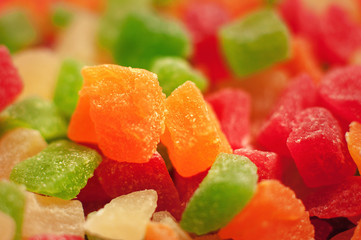 Heap of sweet colorful delicious candied fruits. Macro shot