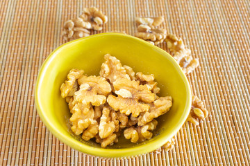 Bowl of walnuts  on the table.