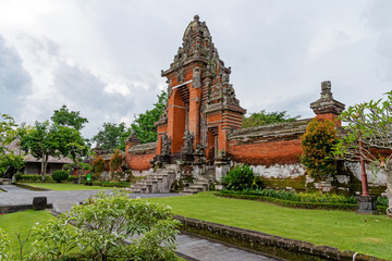 Fototapeta na wymiar Gate at Taman Ayun Hinduism Temple in Mengwi Bali Indonesia.