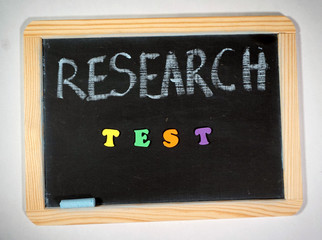 Fototapeta na wymiar research test message on chalkboard