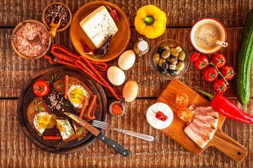 Fried bread with egg and bacon. Hearty meal. Vegetables and fried egg. Healthy breakfast.