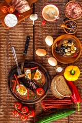 Fried bread with egg and bacon. Hearty meal. Vegetables and fried egg. Healthy breakfast.
