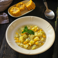 soup with corn and vegetables (first course). top food background. copy spa