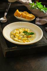 soup with corn and vegetables (first course). top food background. copy spa