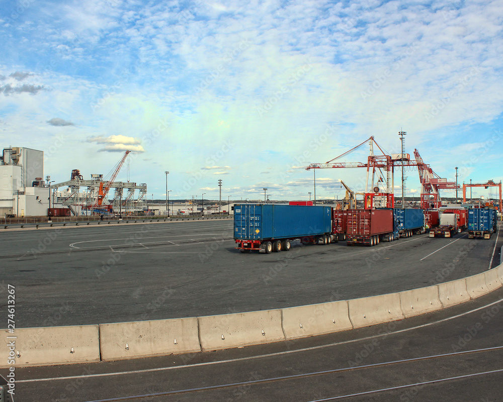 Wall mural freight loading on container cars in port