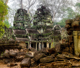 Fototapeta na wymiar Crumbling temple complex of Angkor Wat, Cambodia