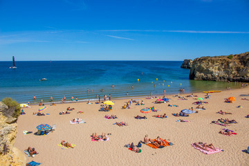 Crowded Beach with Cliffs in the Algarve Lagos Portugal