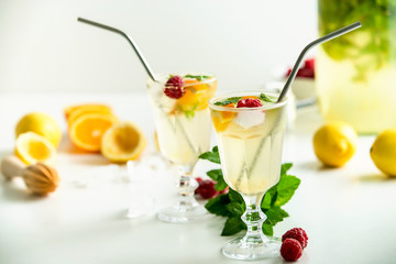 ingredients for home made lemonade on white background