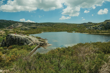 Fototapeta na wymiar Lake from dam in a rocky terrain on highlands