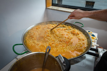 cooking paella in the kitchen