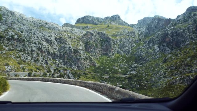 The Knotted tie - nudo de corbata road, Driving A Car On The Serpentine, Cap De Formentor On Mallorca, Beleric islands, Spain, Point of view shot