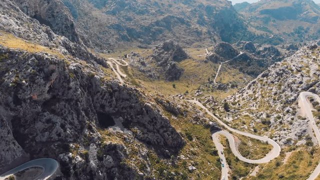 aerial drone parallax shot over the road The Knotted tie - nudo de corbata in the Serra De Tramuntana mountain, Mallorca, Balearic Islands