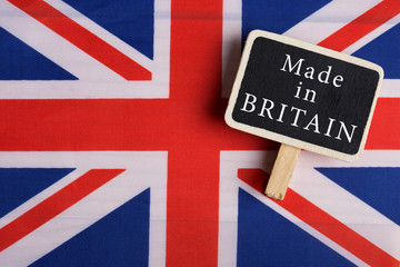 Fototapeta na wymiar services concept - Great Britain country's flag, blackboard with text Made in Britain
