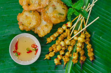 Phan Thiet street foods made from squid: grilled squid cake and fried squid's mouth - Rang muc nuong