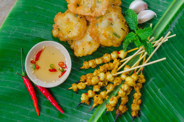 Phan Thiet street foods made from squid: grilled squid cake and fried squid's mouth - Rang muc nuong