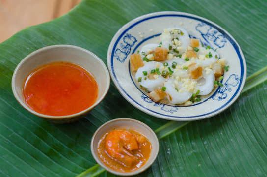 Banh Beo in Phan Thiet style. Banh Beo commonly calls Bloating Fern-shaped cake in English. It is kind of rice cake in small size use with shrimp and pork meat mixed tomato sauce