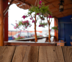 Blurred background of nature forest park with wooden table