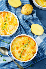 Pumpkin potato gratin with fresh thyme leaves