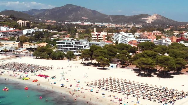 Tilt up aerial shot of the Santa Poncha beach on a sunny day.