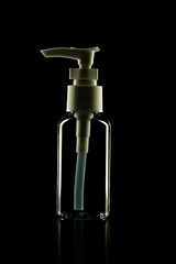Blank packaging cosmetic pump bottle isolated on black background with clipping path.