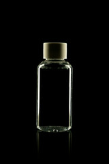 Cosmetic product bottle for cream, foam, shampoo on black background