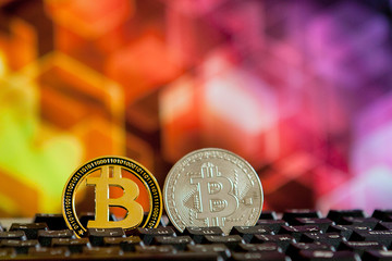 Bitcoin currency on keyboard computer on bokee background.Virtual cryptocurrency concept.