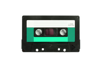 Audio compact cassette. Analog tape format for audio playing and recording. Green audio cassette isolated on white background.