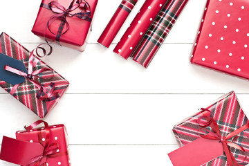 Obraz premium Christmas background with gift boxes, top view with copy space