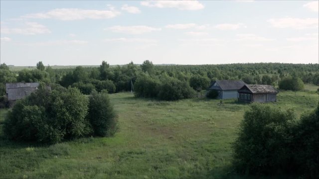 Abandoned village in Russia. Old wooden houses, taken from the drone